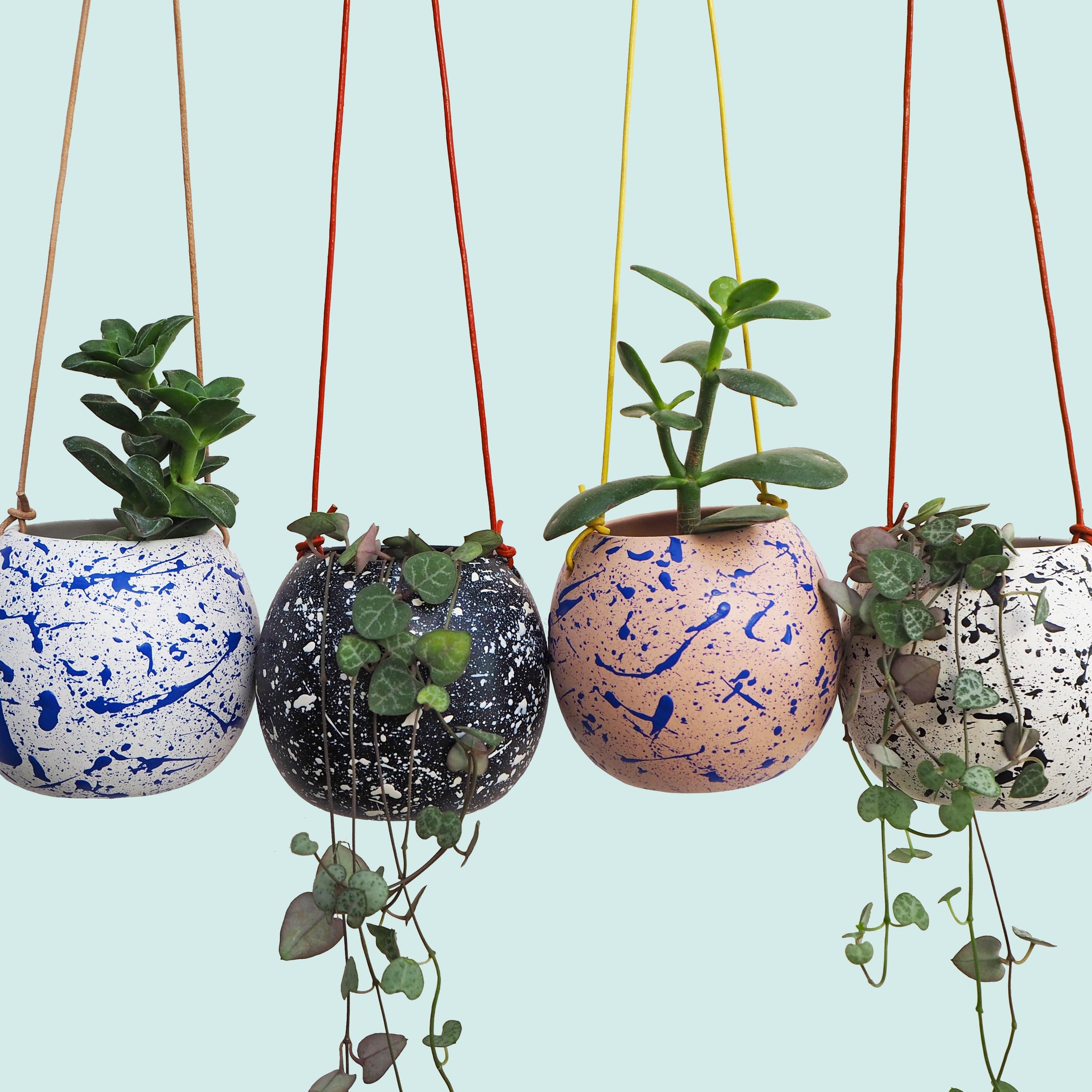 multi coloured hanging plant pots Round Splatter Hanging Planters